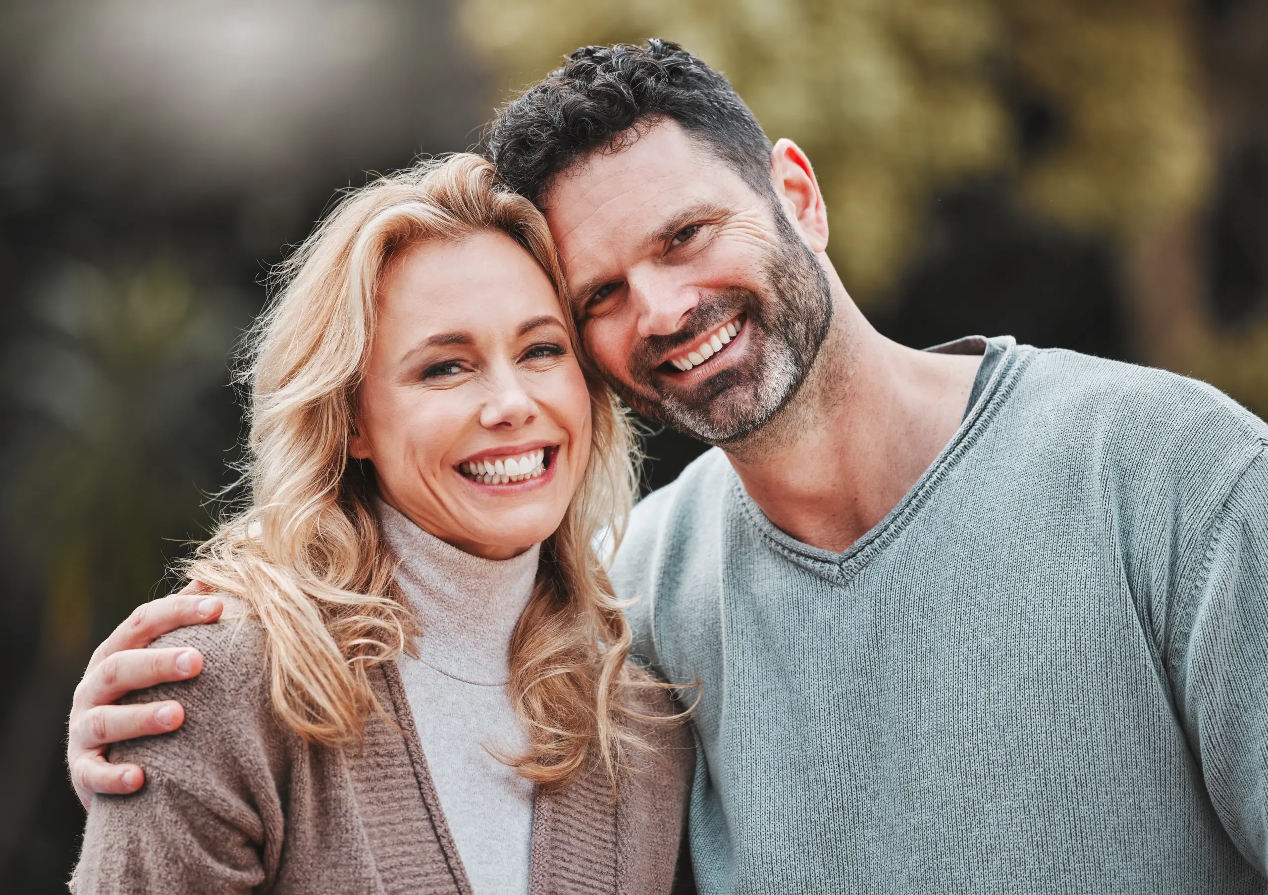 happy couple appreciates the modern dental technology in use for soft tissue grafting