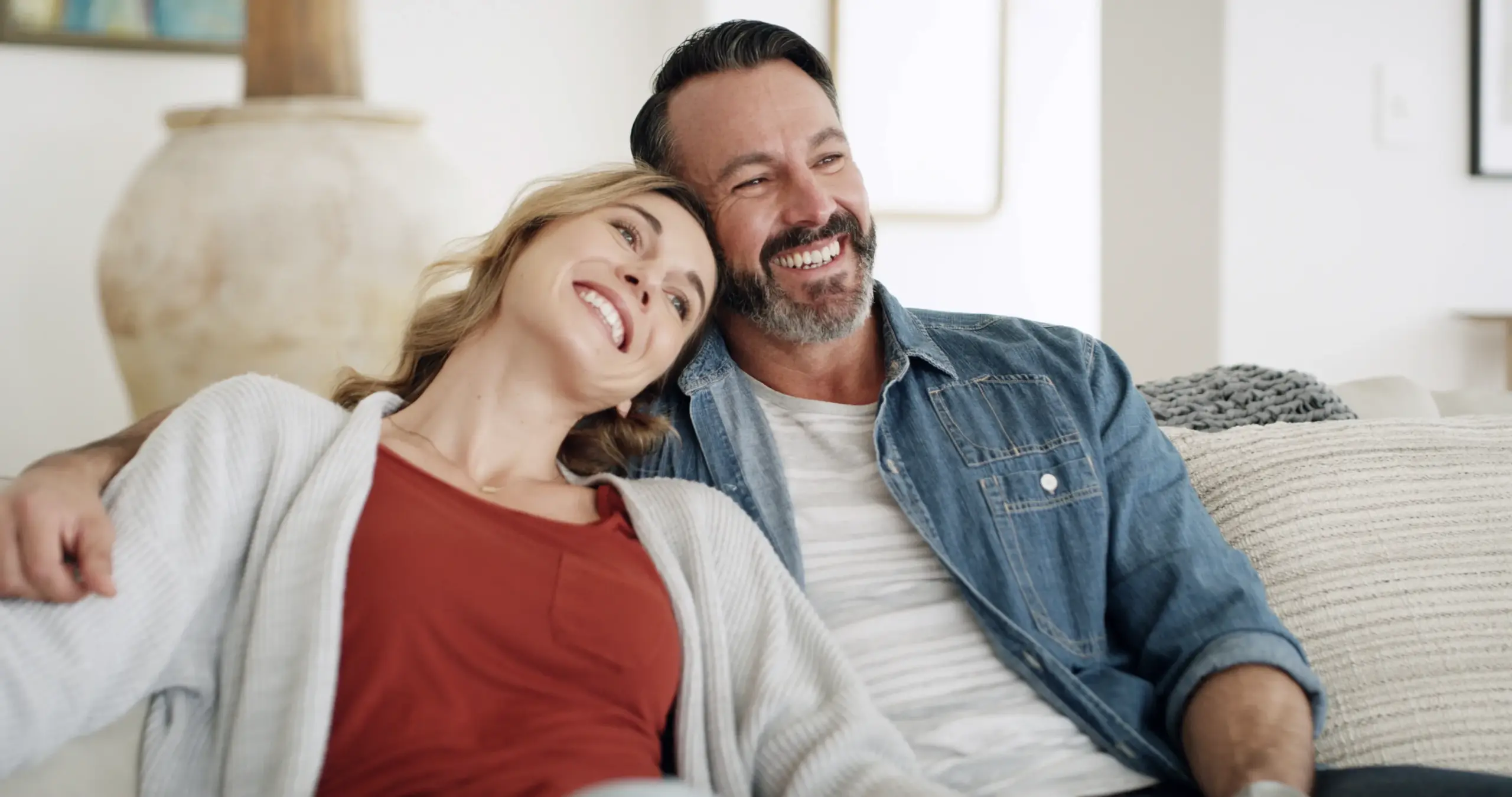 couple smiling after anxiety-free dental experience in Geneva IL